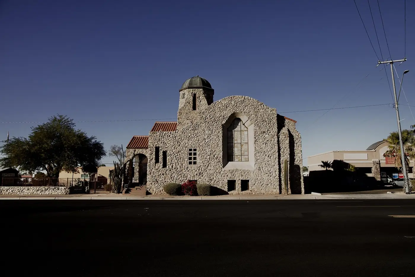 Old stone church in Casa Grande at dusk